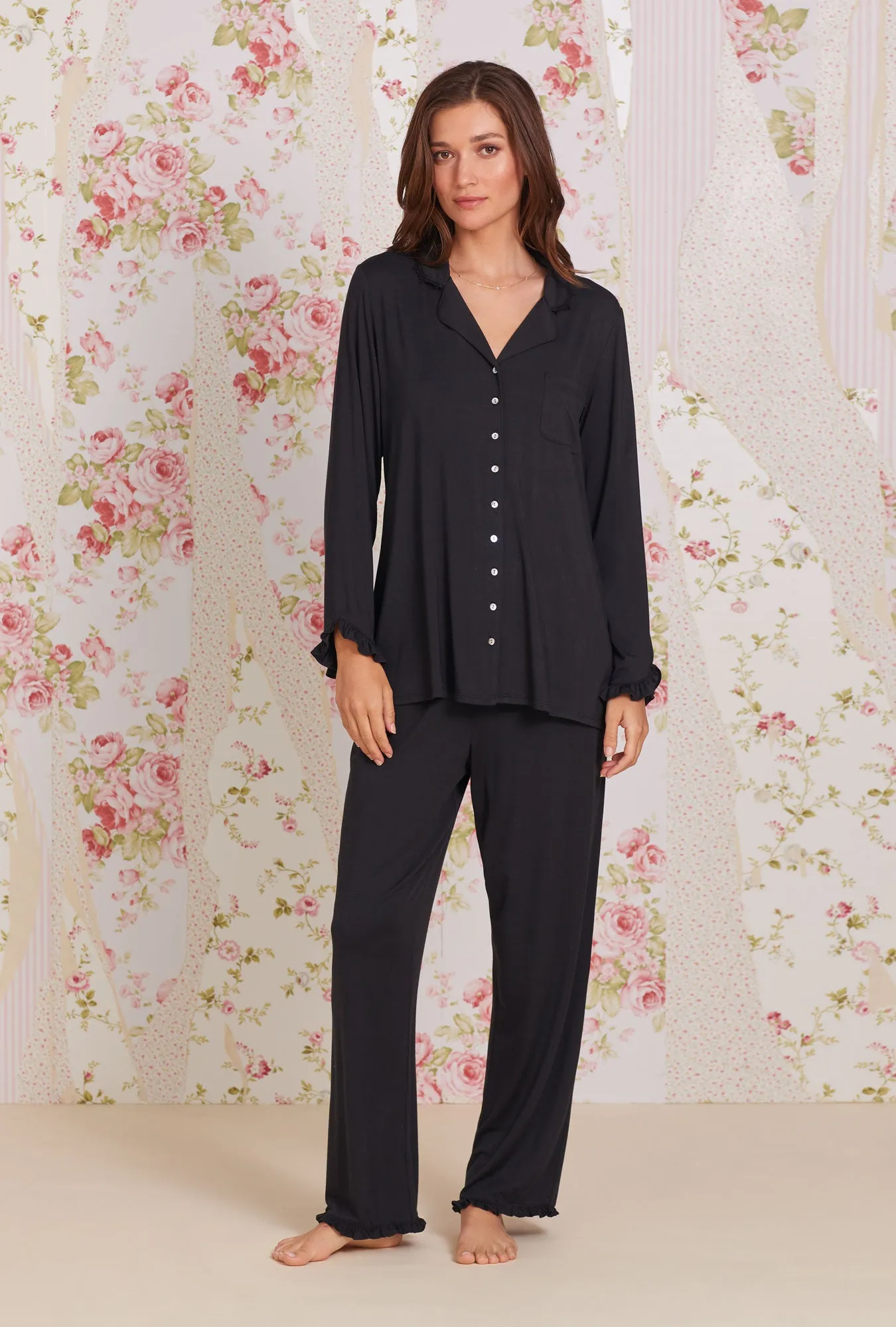 Elevate the visibility and appeal of your product by optimizing the title. Heres an enhanced version:

Luxurious Iconic Black Tencel™ Modal Classic Notch Collar Pajama Set

This title includes rich modifiers that highlight the quality and style of the product.