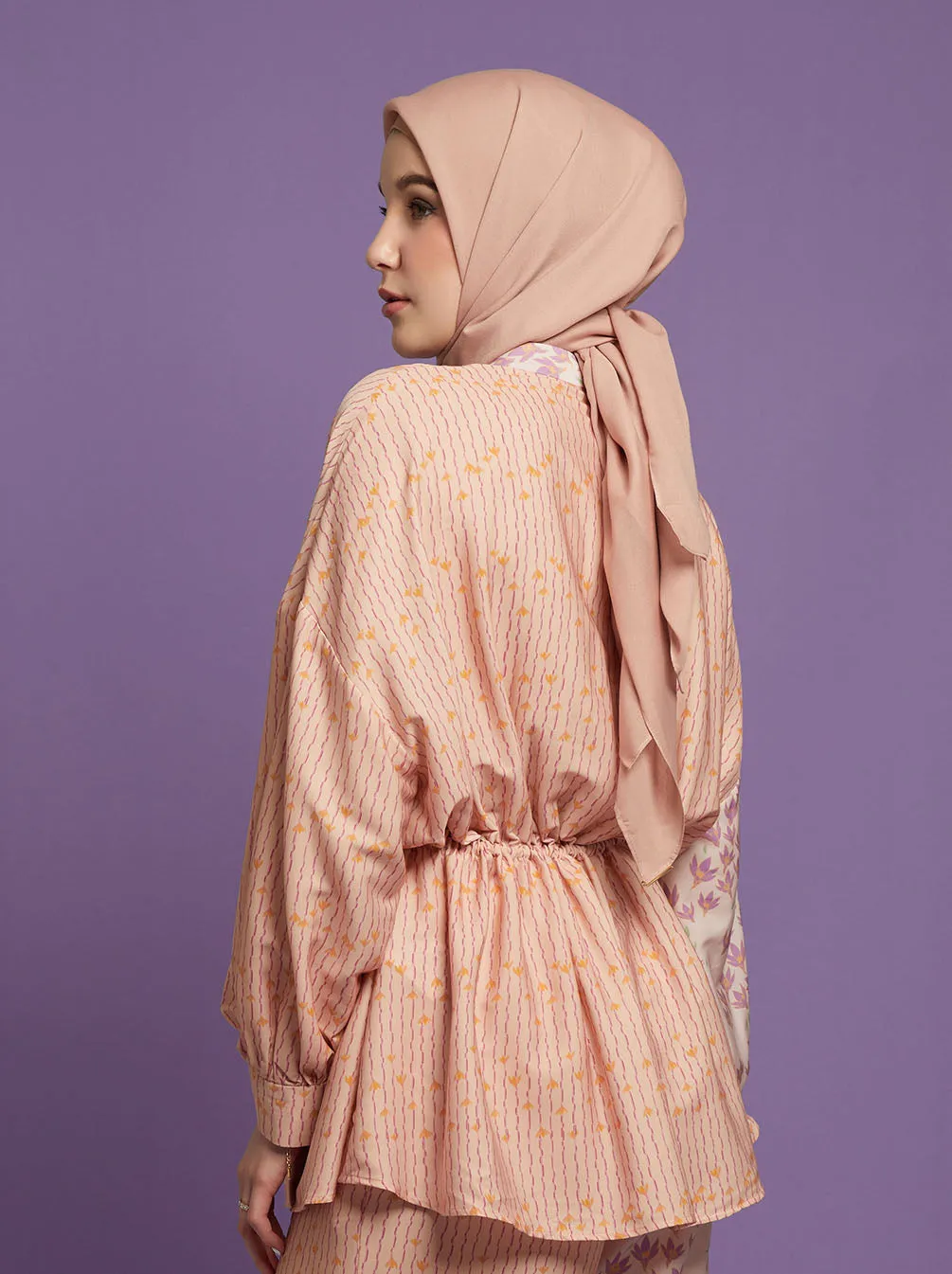 NAIRA ASYMMETRICAL TOP PEACH PINK