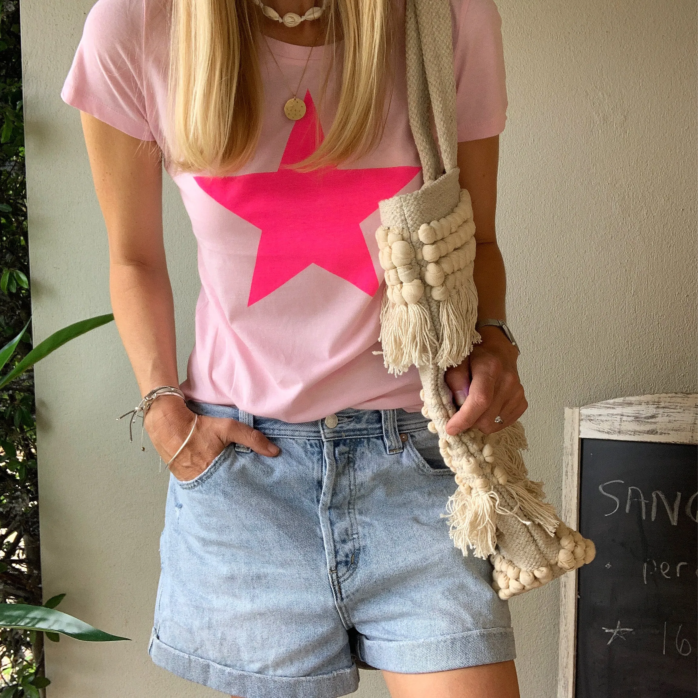 Neon pink star on pink tee