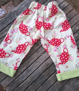 " Tea Party" childs short trousers, capri pants with contrast turn back age to fit 4-5